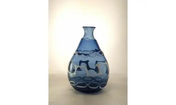 Blue bottle with white decoration